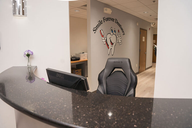 Reception desk at smile forever dentistry